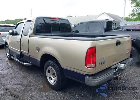 2000 Ford F150 из США, поврежденный, VIN 1FTRX17L0YNA64787